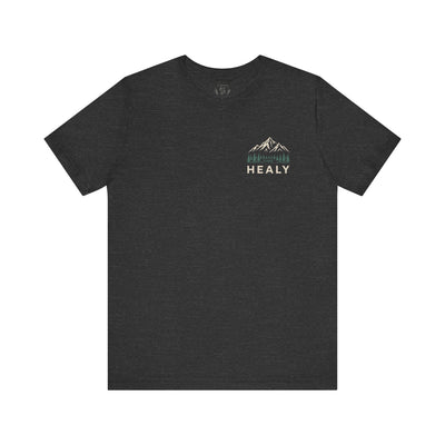 Soft jersey t-shirt with a detailed Healy Alaska mountain and spruce illustration in earthy tones by Evernorth — view 17