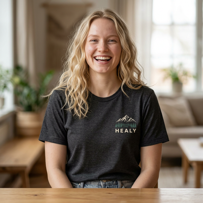 Soft jersey t-shirt with a detailed Healy Alaska mountain and spruce illustration in earthy tones by Evernorth — view 8
