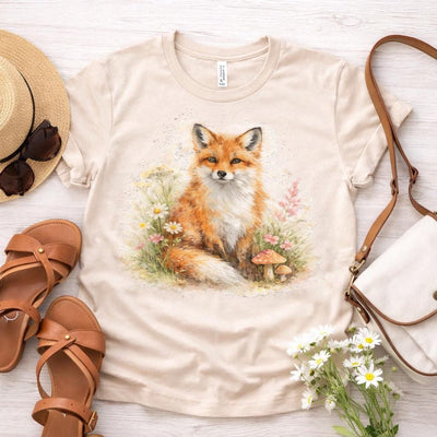 Watercolor Fox Tee, Sitting Fox with Flowers and Mushrooms, product photo, botanical graphic tee by Evernorth Design