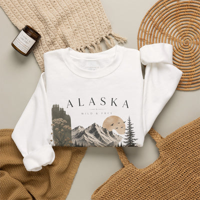 Soft crewneck sweatshirt with a muted Alaska mountain, lake, evergreen and moose illustration by Evernorth — view 11
