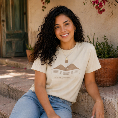 Minimalist Mountains T-Shirt, grounded. present. free. Nature Graphic Tee, styled product mockup, nature-inspired graphic tee by Evernorth Design
