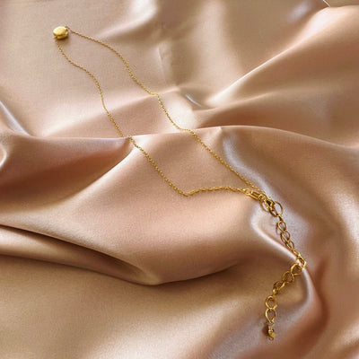 Quiet Light Disc Necklace, product photo, elevated everyday minimal jewelry by Evernorth Design