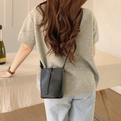 Northern Light Mini Crossbody Bag, side view, in black, elevated everyday everyday bag by Evernorth Design