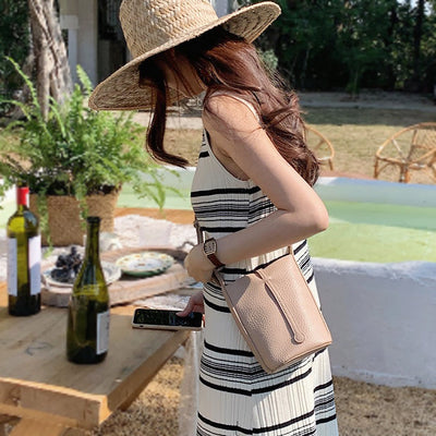 Northern Light Mini Crossbody Bag, modeled lifestyle photo, in khaki, elevated everyday everyday bag by Evernorth Design